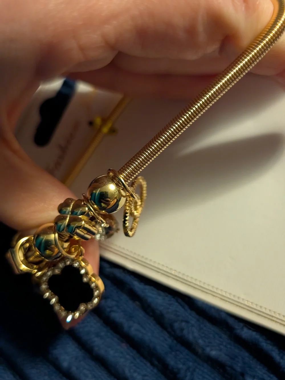Gold Charm Bracelet with Black Clover Pendant